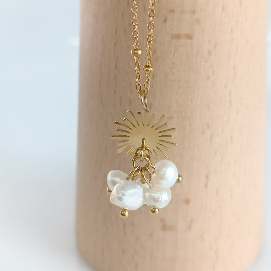 Collar con sol y perlas