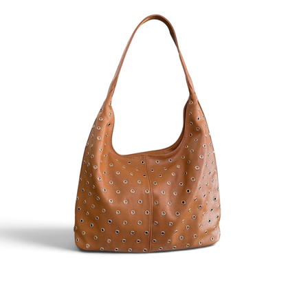 Bolso tacha
