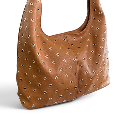 Bolso tacha