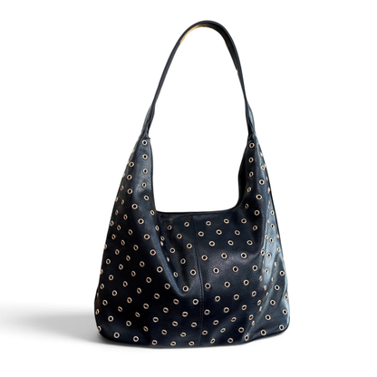 Bolso tacha