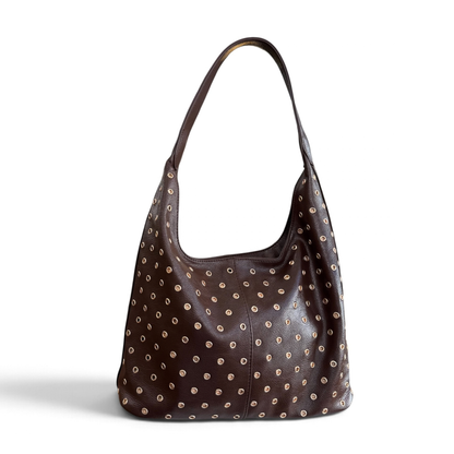 Bolso tacha