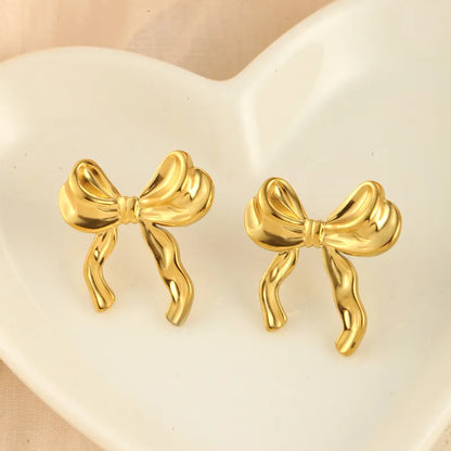 PENDIENTES LAZOS DORADOS