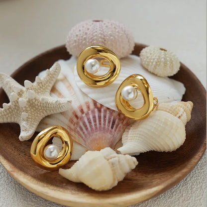 Pendientes redondos con perlas